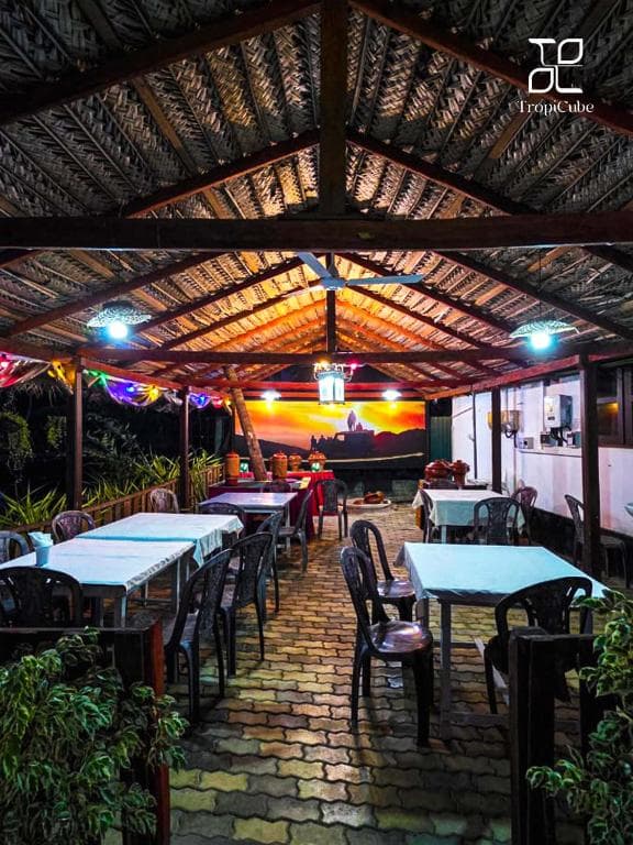Outdoor covered restaurant with lights at Lake View Resort