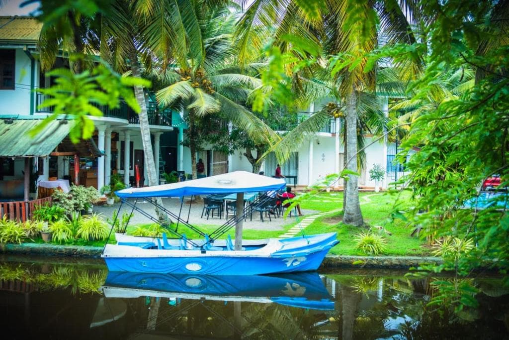 Lakeside view with blue boat at Lake View Resort